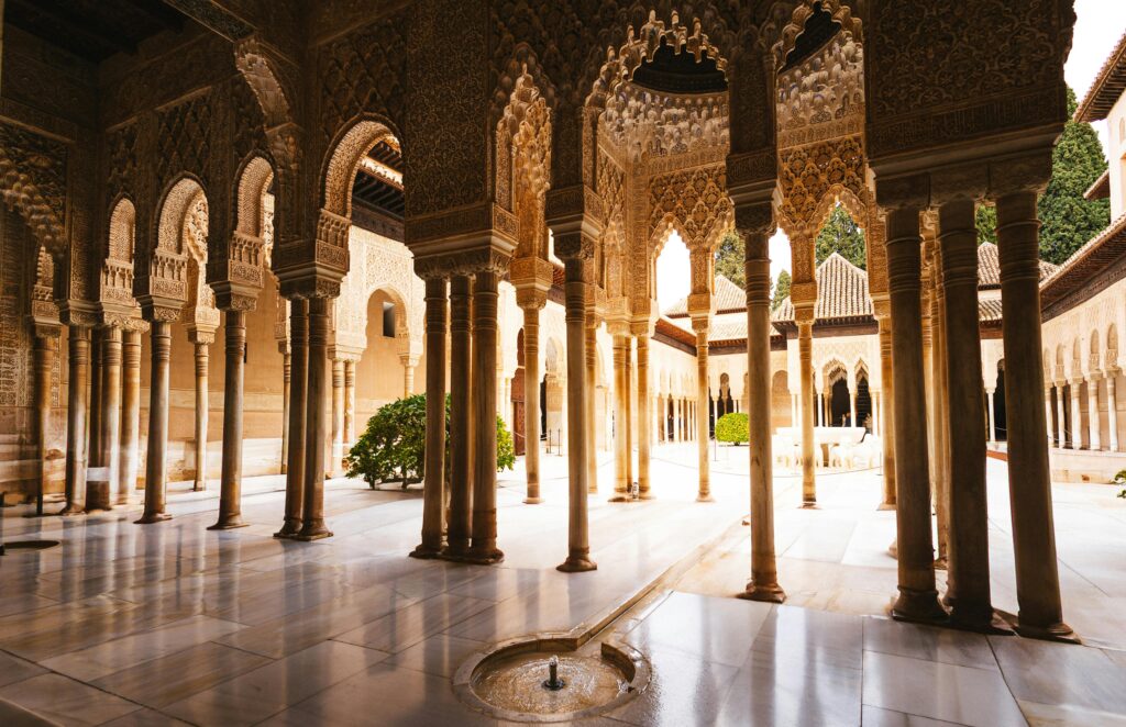 View of the Alhambra palace complex at sunset in Granada, Spain